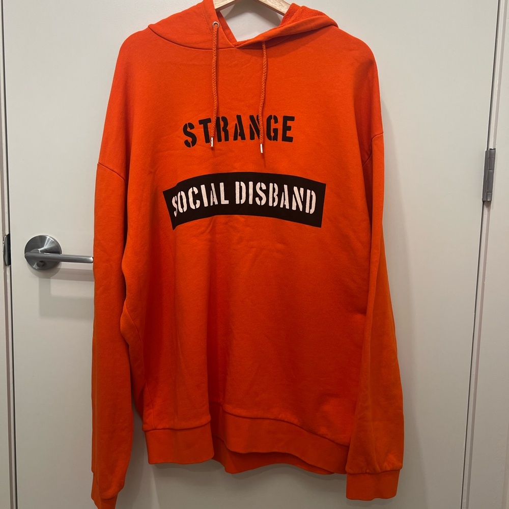 ASOS Orange Hoodie Size L – “Strange Social Disband” Graphic Pullover